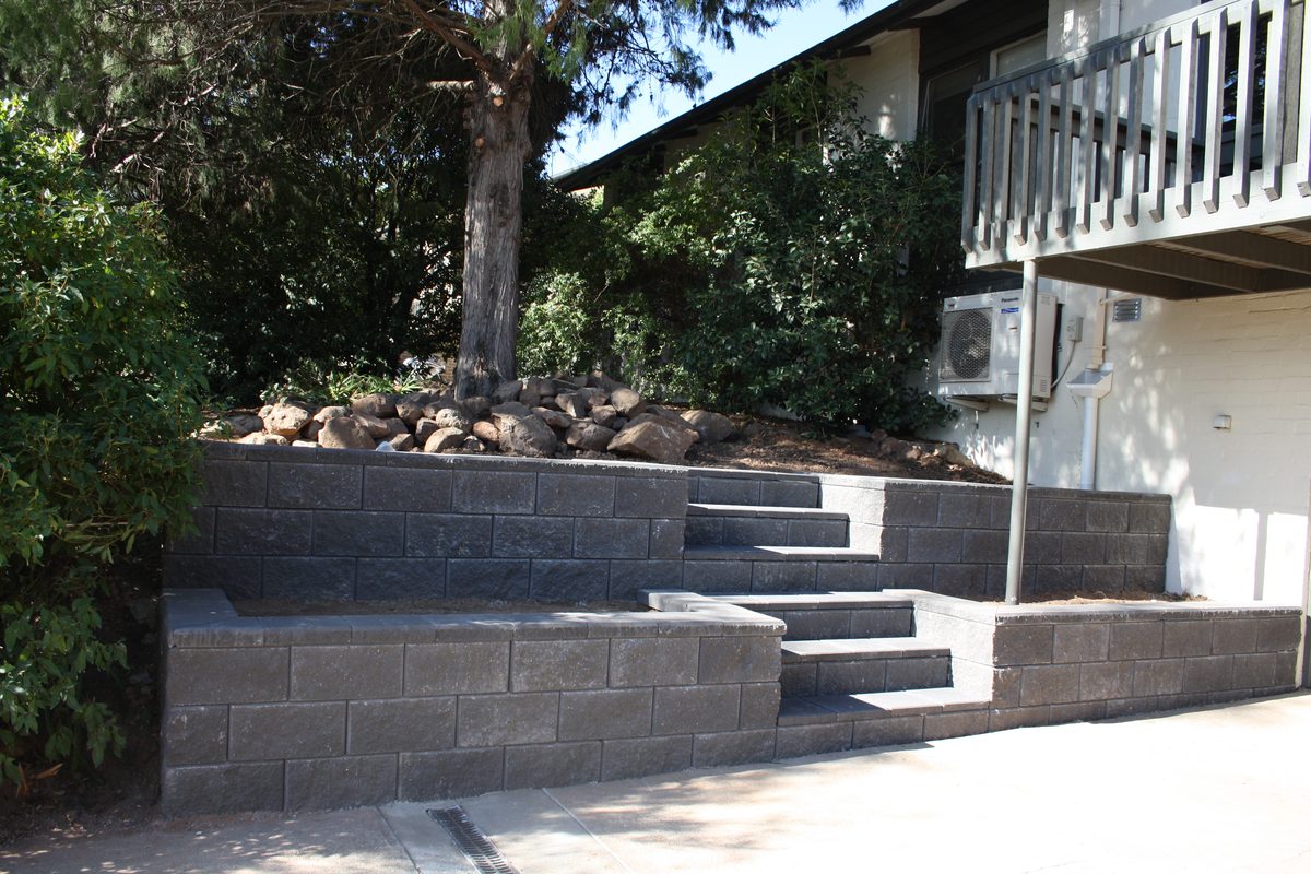 Block retaining wall and steps