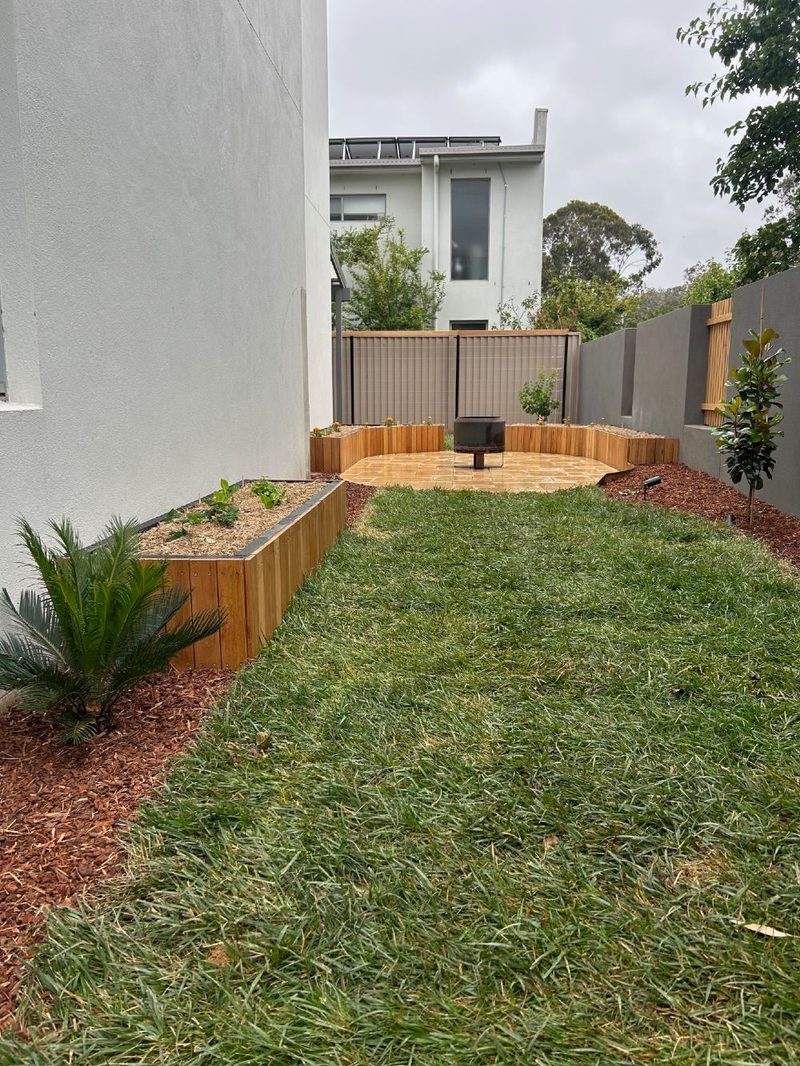 Raised timber garden bed and lawn