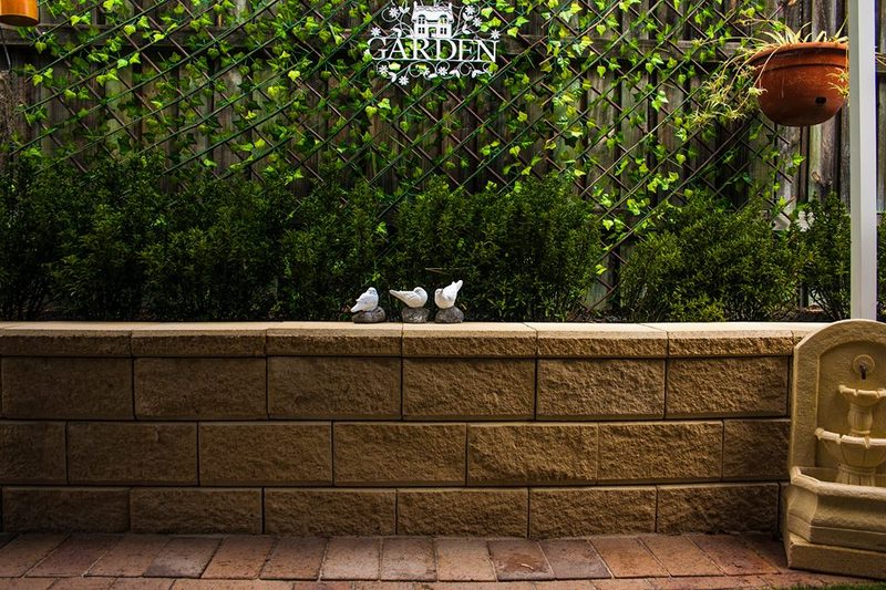 Retaining wall with garden planting